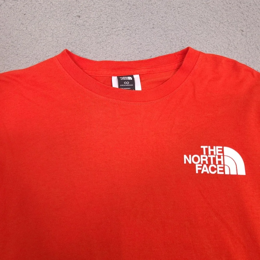 The North Face T-Shirt Mens Small Orange Circular Design Long Sleeve Graphic‎